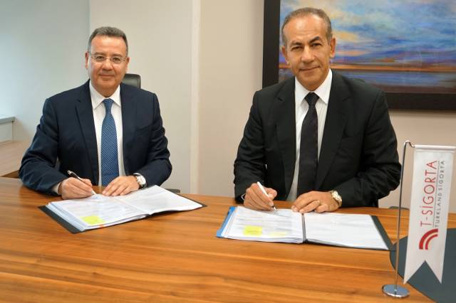 Maher Holding Yönetim Kurulu Başkanı Mahmut Erdemoğlu ve Turkland Sigorta Yönetim Kurulu Başkanı Omar Bilani.